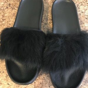 Ugg slides with real lamb fur. NWT